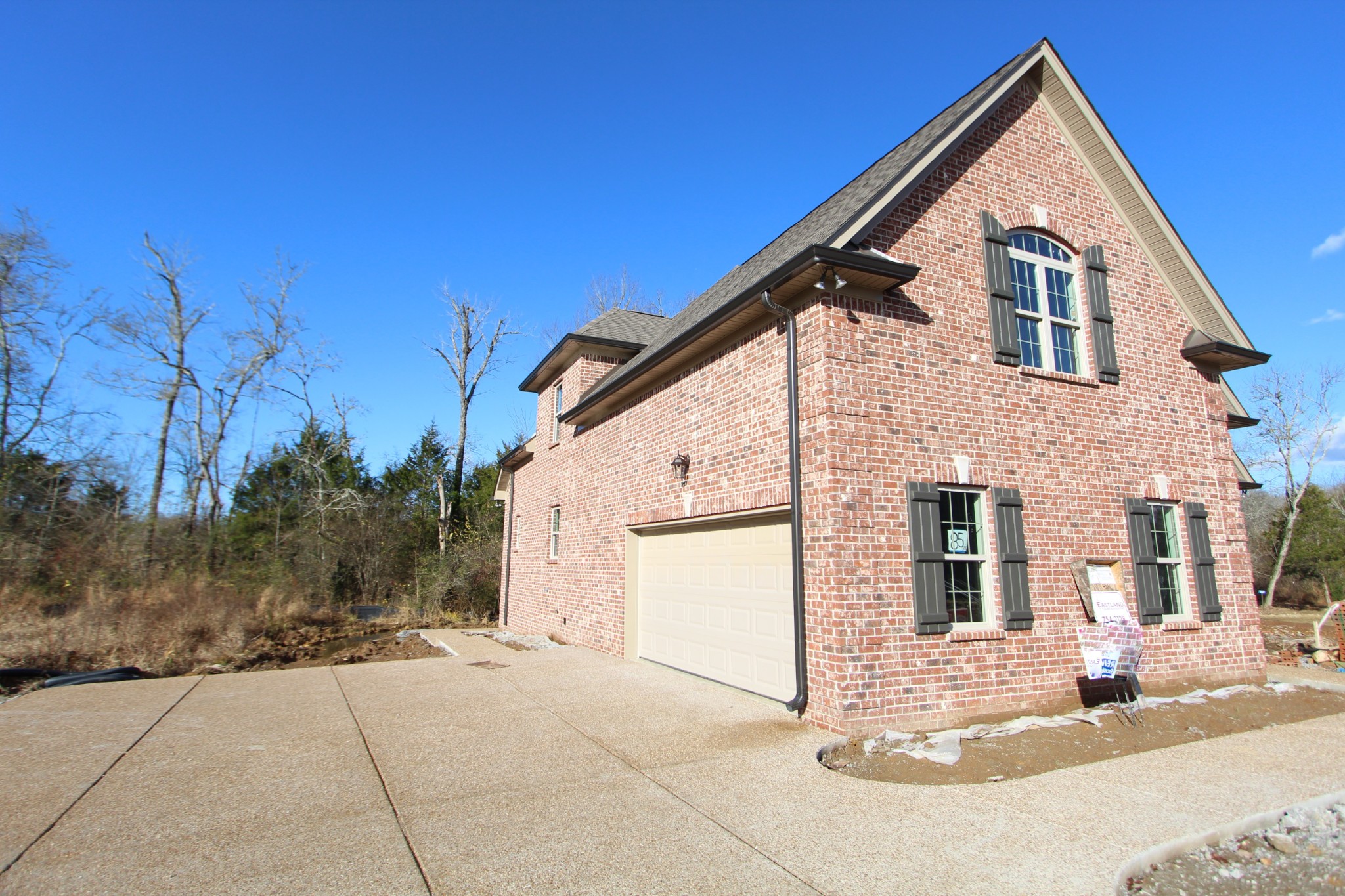 253 Ridgewater Way, Unit 85 Mount Juliet, TN 37122 - Photo 23 of 23 a view of a house with backyard and trees