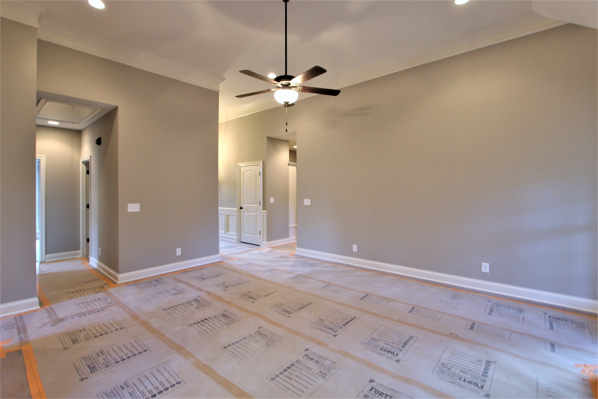 253 Ridgewater Way, Unit 85 Mount Juliet, TN 37122 - Photo 4 of 23 a view of an empty room with a ceiling fan