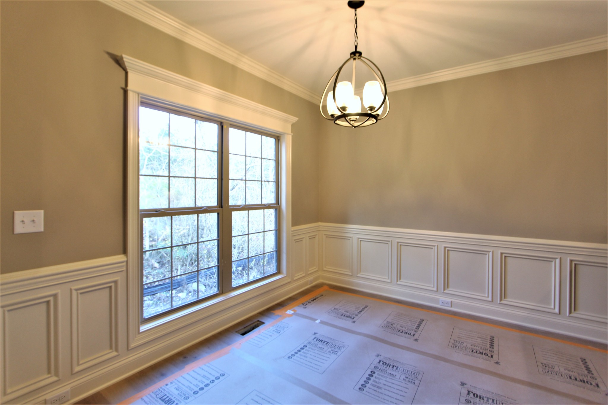 253 Ridgewater Way, Unit 85 Mount Juliet, TN 37122 - Photo 6 of 23 a view of empty room with wooden floor and fan