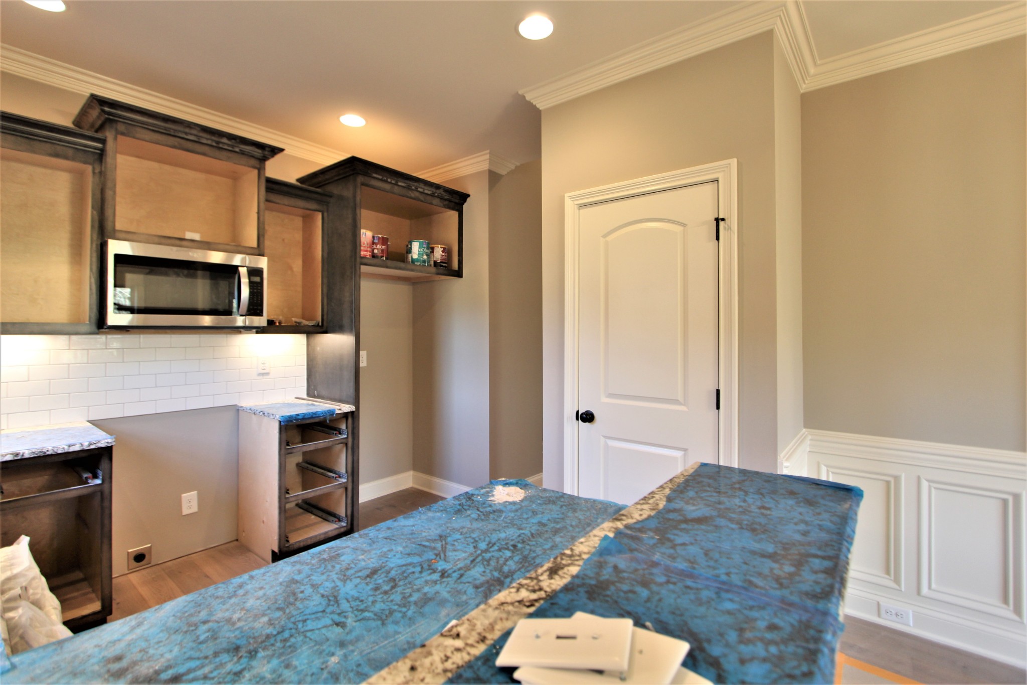 253 Ridgewater Way, Unit 85 Mount Juliet, TN 37122 - Photo 9 of 23 a living room with stainless steel appliances furniture a refrigerator and a kitchen counter top