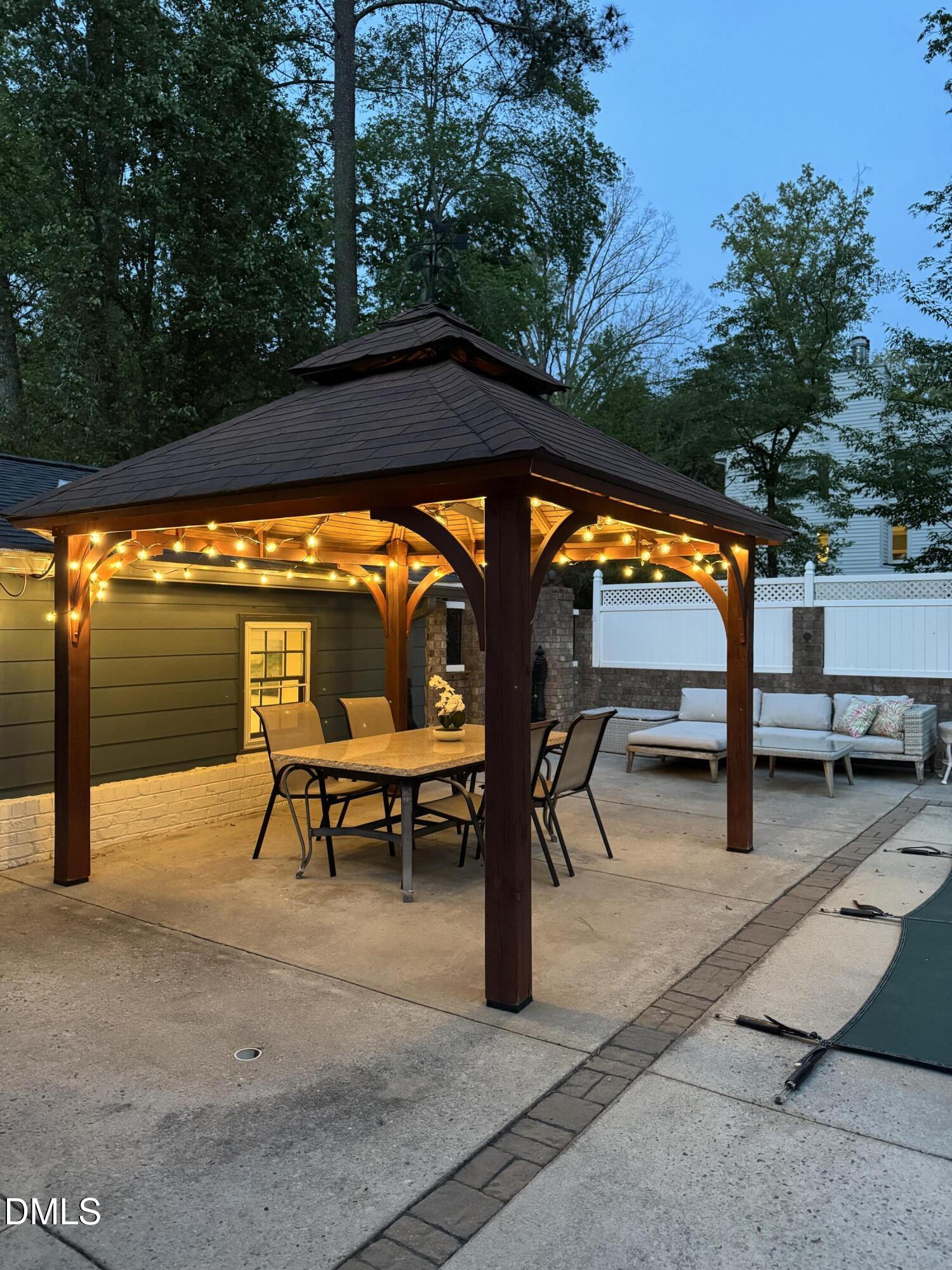 3704 Swann Street Raleigh, NC 27612 - Photo 21 of 21 a view of swimming pool with outdoor seating