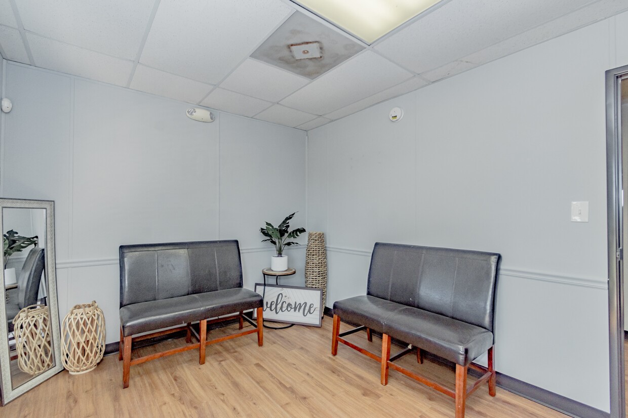 3373 East Highway 6 Alvin, TX 77511 - Photo 16 of 28 a living room with furniture and a flat screen tv