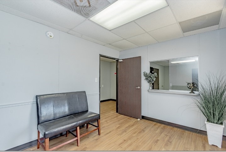 3373 East Highway 6 Alvin, TX 77511 - Photo 19 of 28 a living room with furniture and wooden floor
