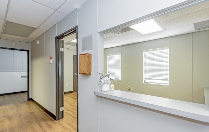 3373 East Highway 6 Alvin, TX 77511 - Photo 20 of 28 a bathroom with a granite countertop sink and a mirror