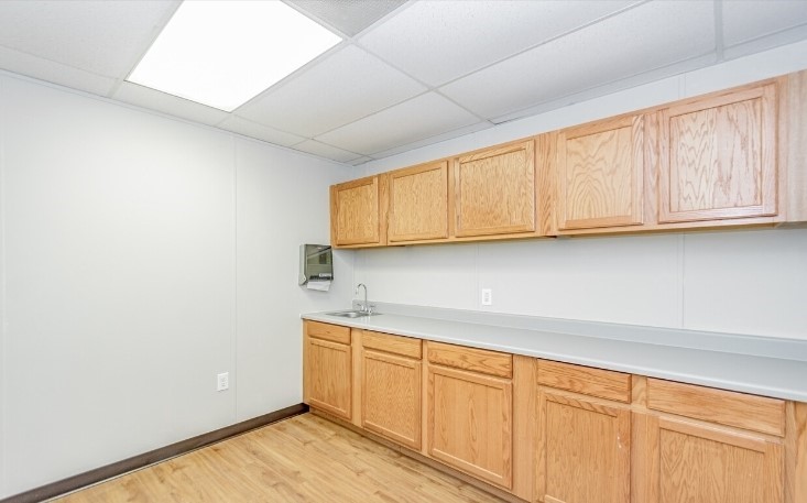 3373 East Highway 6 Alvin, TX 77511 - Photo 21 of 28 a room with cabinets