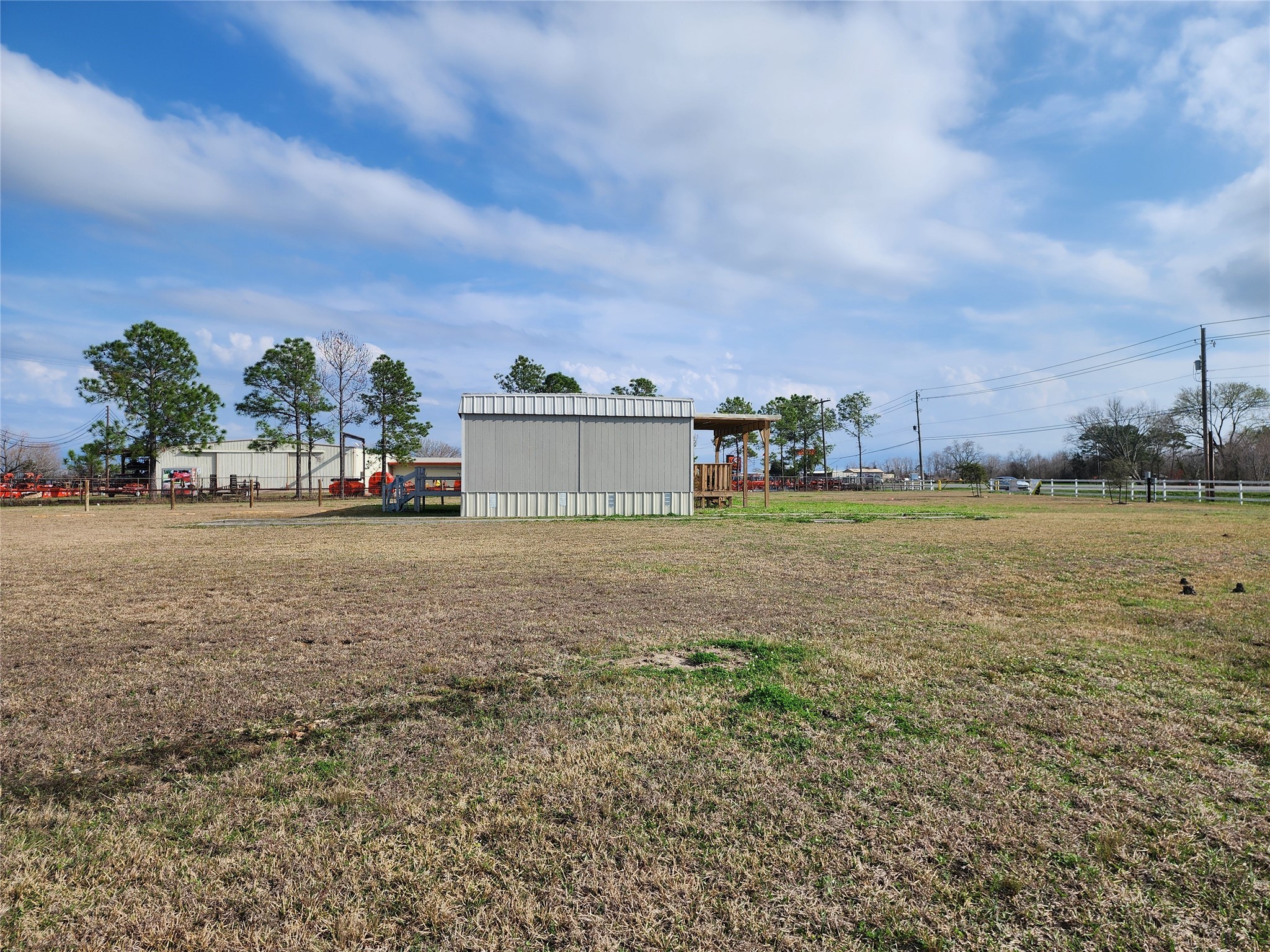 3373 East Highway 6 Alvin, TX 77511 - Photo 3 of 28 a view of a houses with yard and lake view