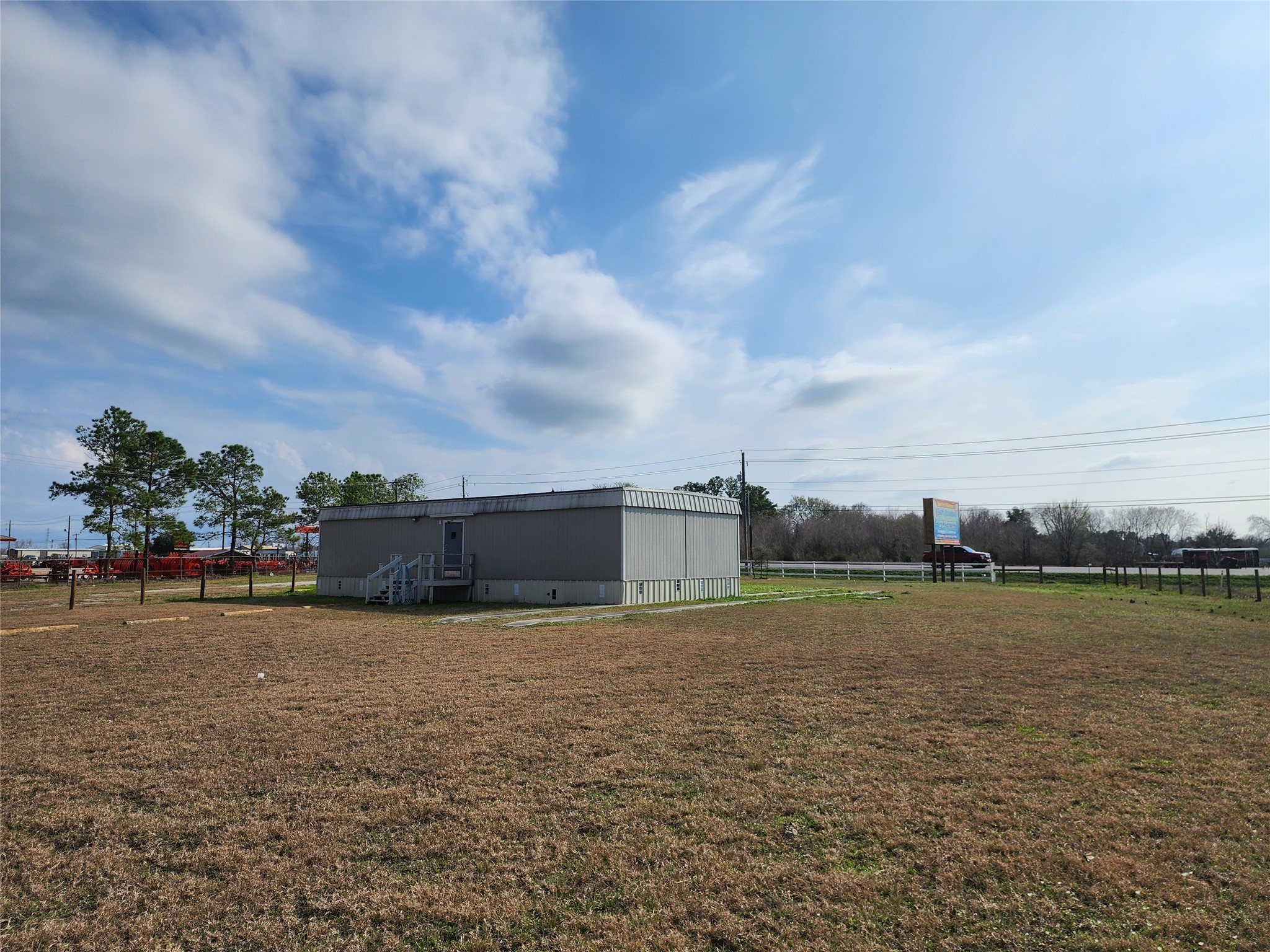 3373 East Highway 6 Alvin, TX 77511 - Photo 5 of 28 a view of a lake with houses in the back
