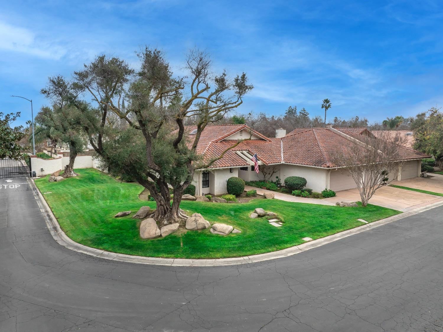 28 Seasons Court Madera, CA 93637 - Photo 1 of 47 a view of a house with a garden space