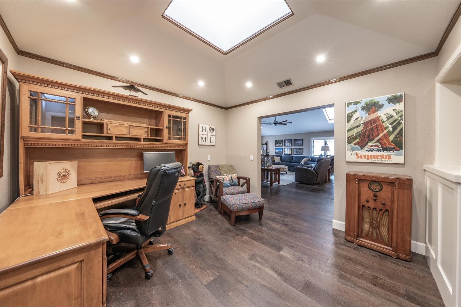 28 Seasons Court Madera, CA 93637 - Photo 5 of 47 a view of a livingroom with workspace and a window