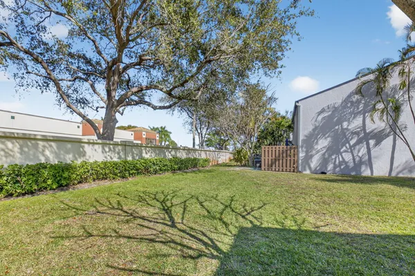 a view of a back yard of the house