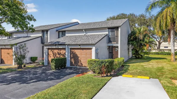 a view of a house with a swimming pool