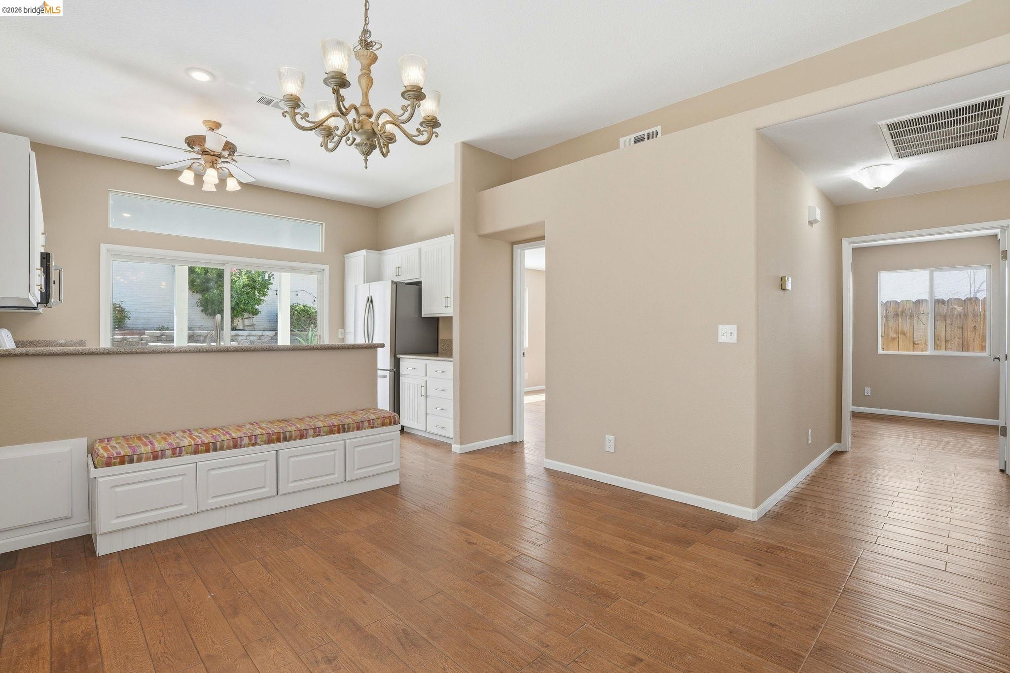 4465 Fall Lane Oakley, CA 94561 - Photo 14 of 26 a view of a big room with wooden floor and windows