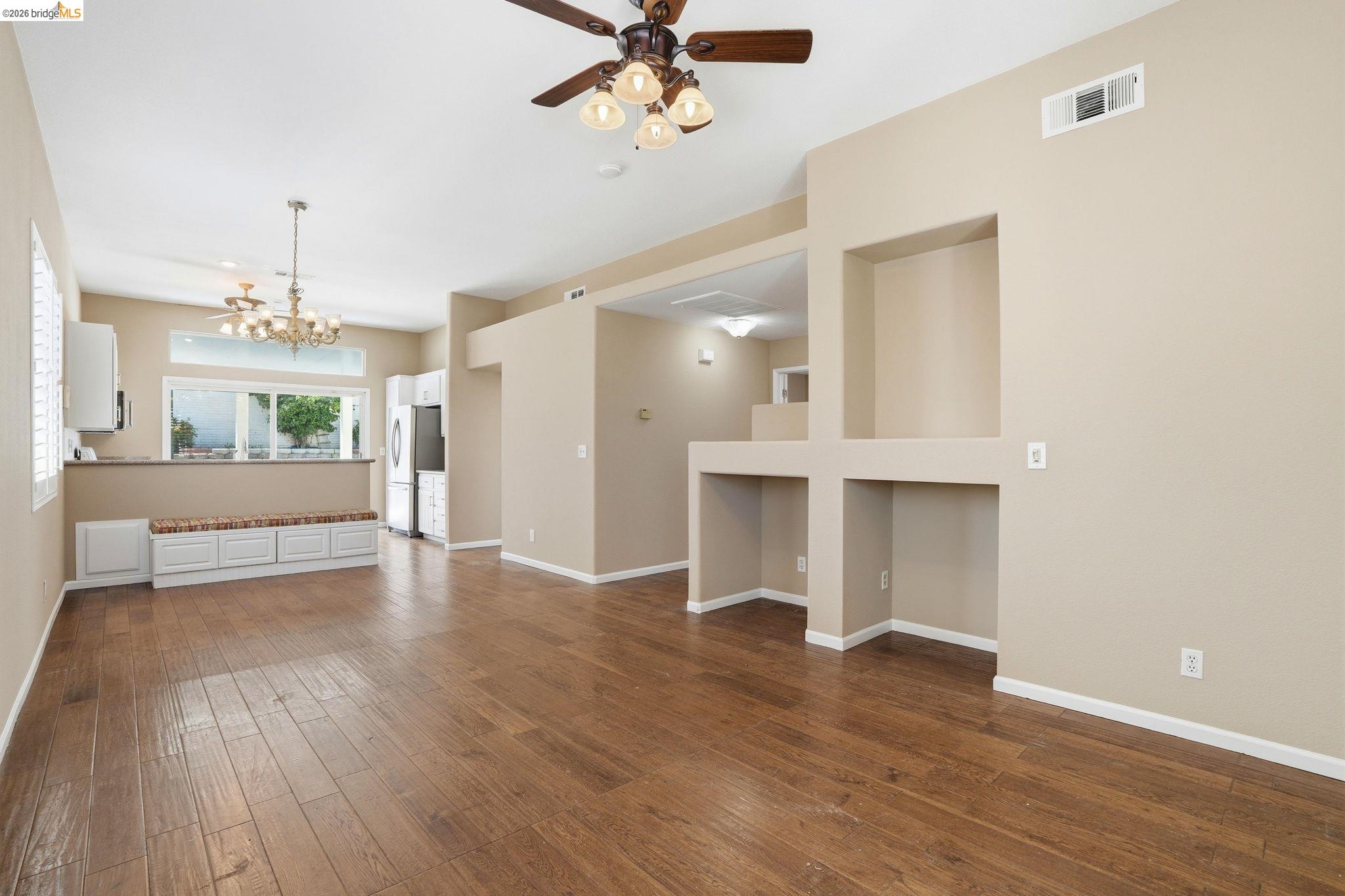 4465 Fall Lane Oakley, CA 94561 - Photo 22 of 26 a view of a living room a kitchen and chandelier