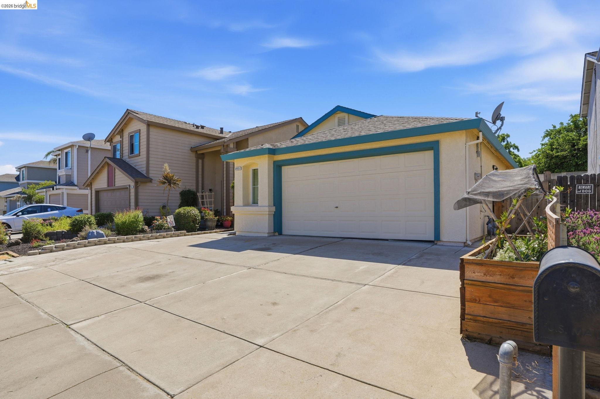 4465 Fall Lane Oakley, CA 94561 - Photo 25 of 26 a front view of a house with garden