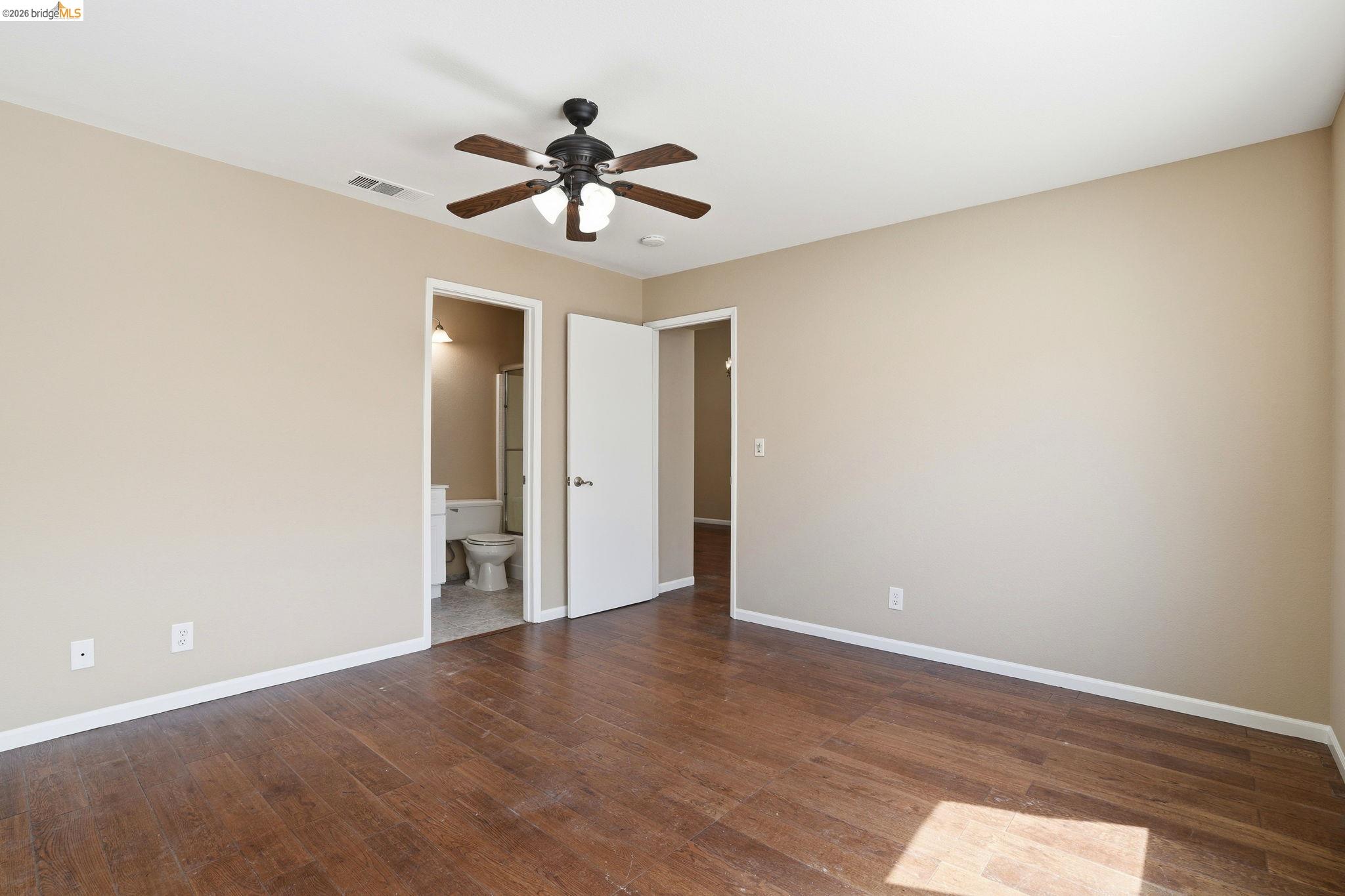 4465 Fall Lane Oakley, CA 94561 - Photo 6 of 26 a view of an empty room with wooden floor