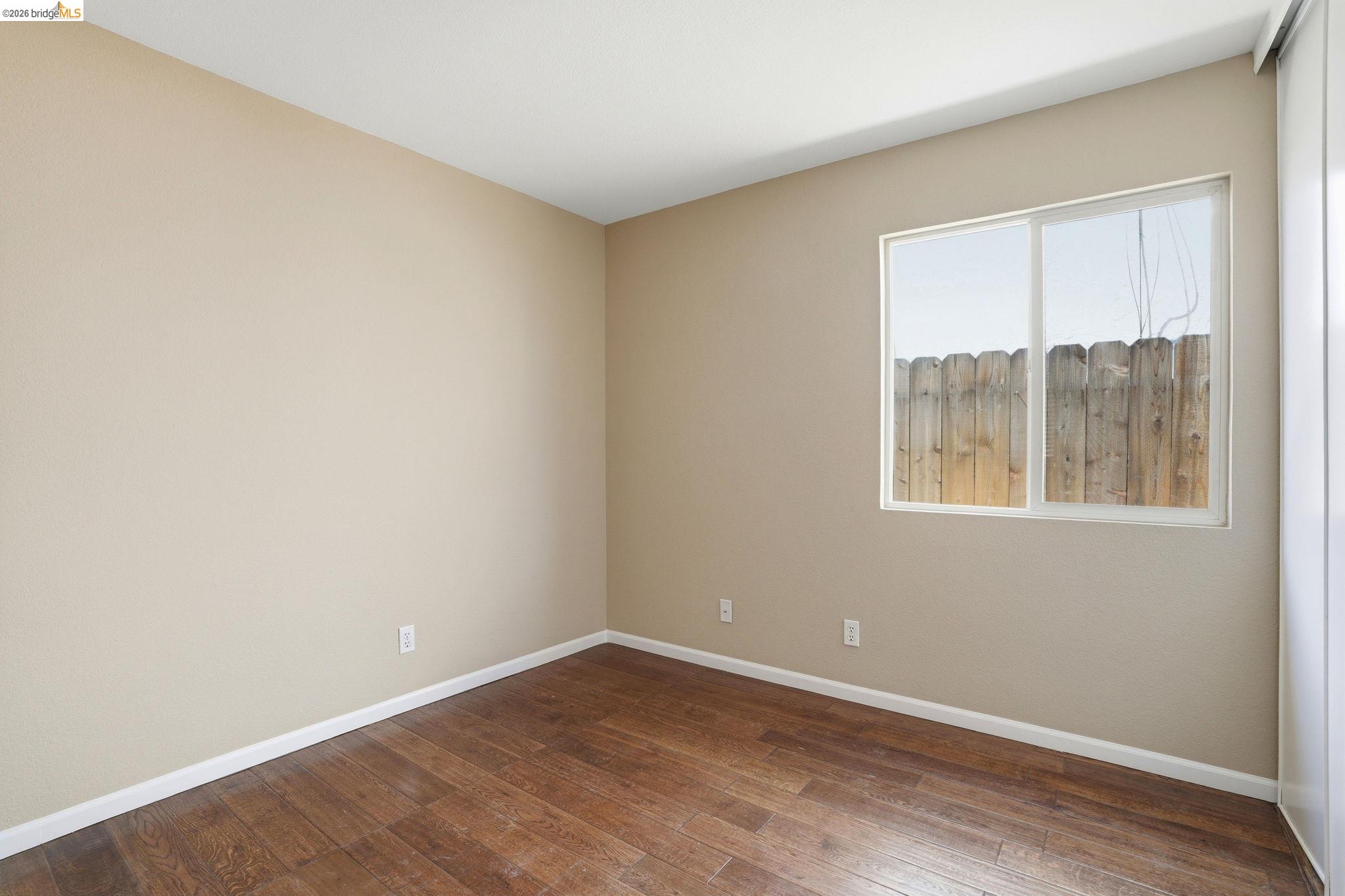 4465 Fall Lane Oakley, CA 94561 - Photo 9 of 26 an empty room with a window