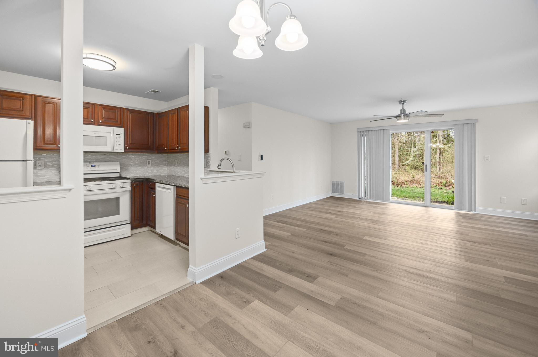 705 Quail Road Marlton, NJ 08053 - Photo 6 of 28 Kitchen w/new lighting, new paint & LVP flooring