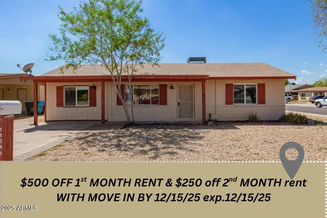 a view of a house with a tree