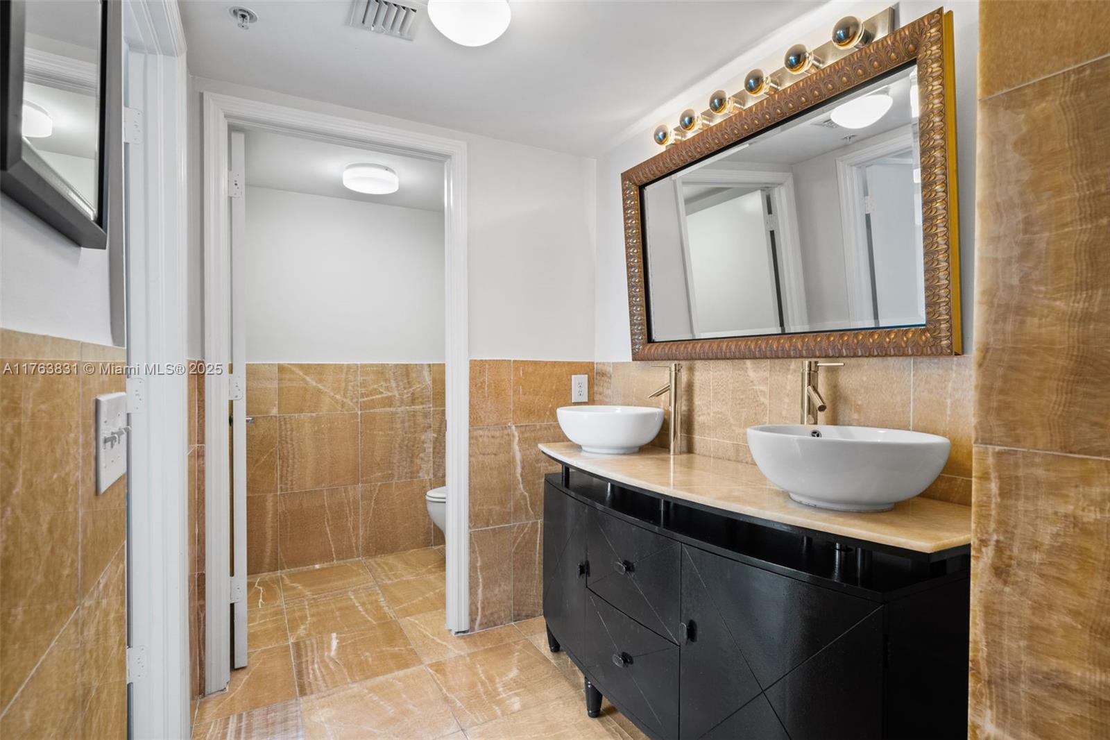 1881 79th Street Causeway, Unit 1906 North Bay Village, FL 33141 - Photo 27 of 39 Primary bathroom