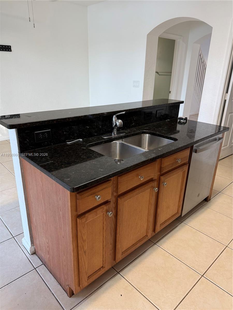 12260 Southwest 27th Street, Unit 1303 Miramar, FL 33025 - Photo 14 of 58 a close view of sink and tap