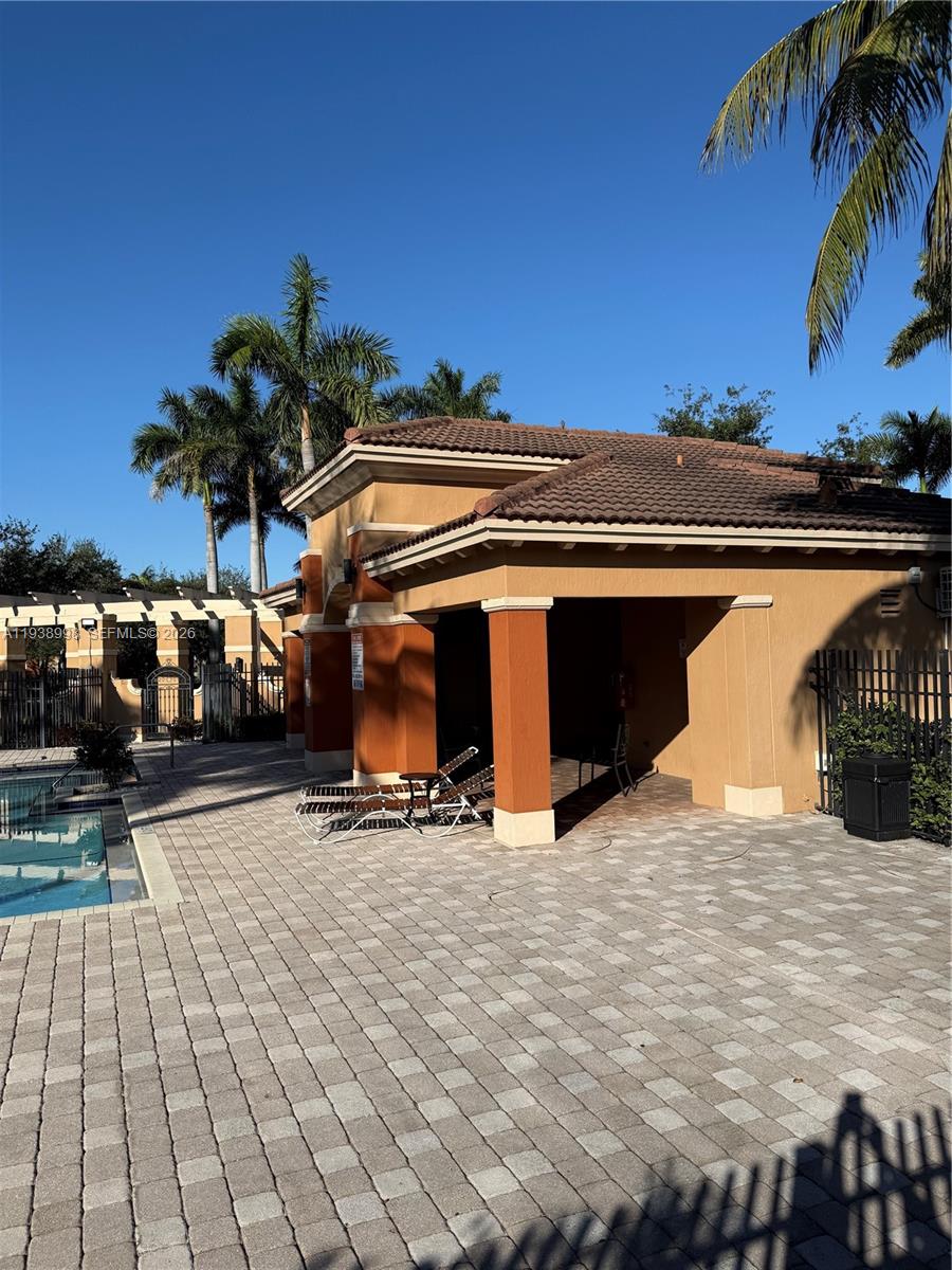 12260 Southwest 27th Street, Unit 1303 Miramar, FL 33025 - Photo 53 of 58 a view of a water closet and storage