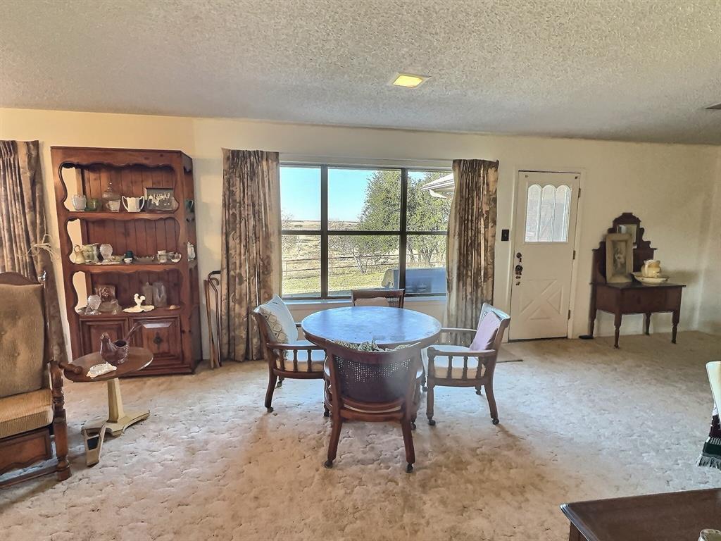 3718 Highway 36 Rising Star, TX 76471 - Photo 12 of 40 a dining room with furniture and window