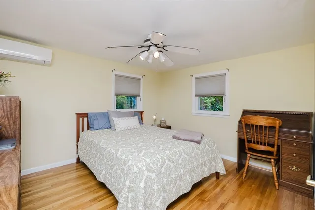 an empty room with furniture and white walls
