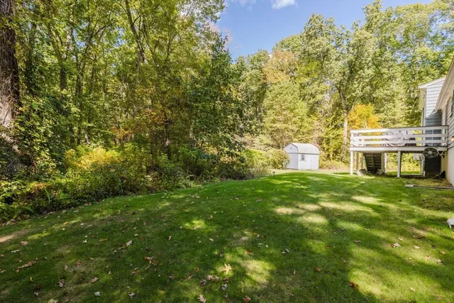 a view of a chairs and table on the deck