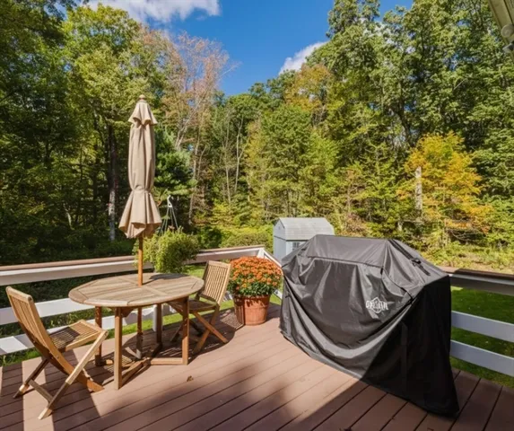 a view of staircase with white walls and a window