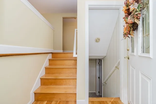 a bed room with furniture and a lamp