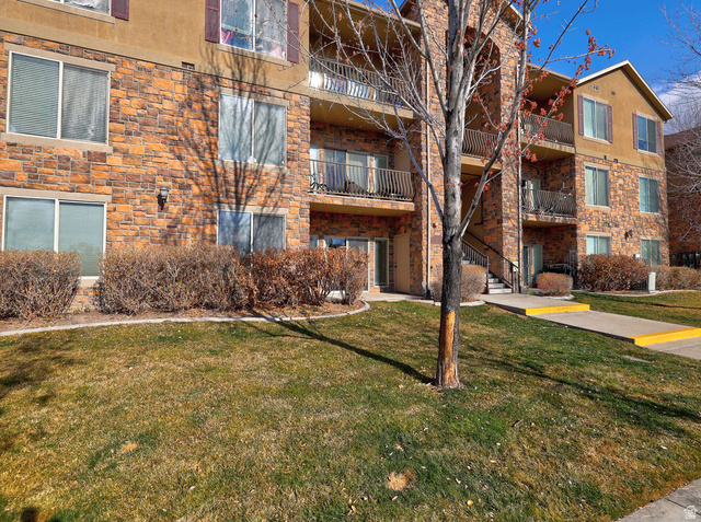 476 West 200 N Street, Unit 108 Springville, UT 84663 - Photo 1 of 1 View of apartment building / complex featuring stairway