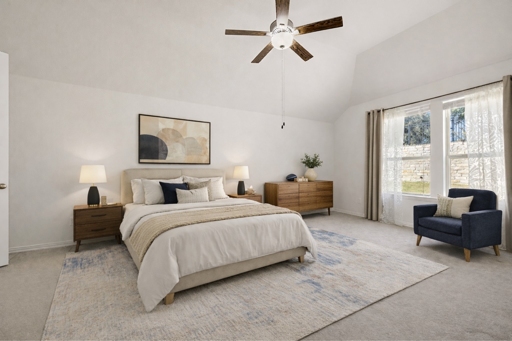 4201 Vespa Cove Leander, TX 78641 - Photo 8 of 29 a spacious bedroom with a bed and a couch