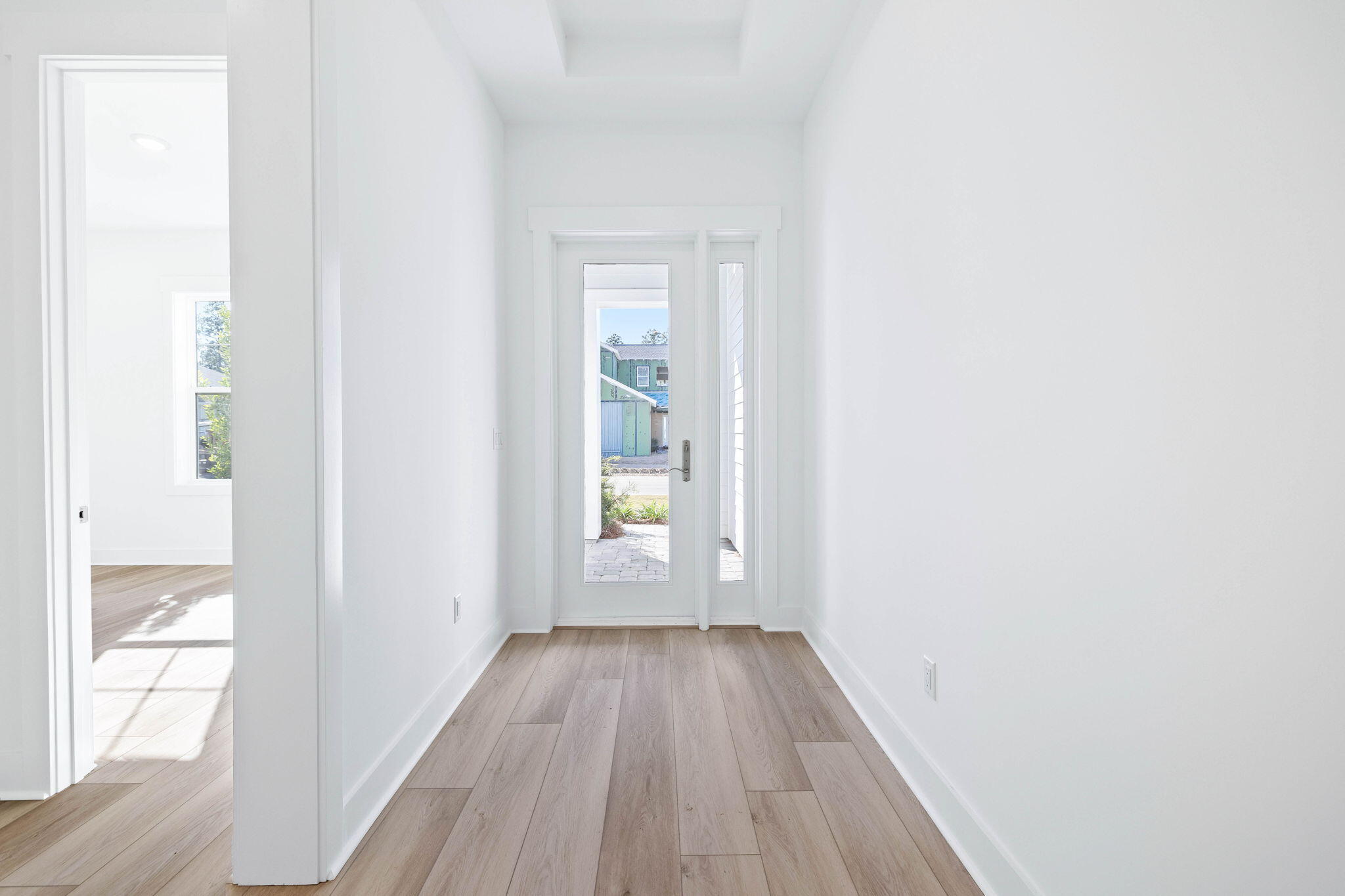 2488 Pathways Dr Inlet Beach Inlet Beach, FL 32461 - Photo 5 of 35 a view of an empty room with wooden floor and a window