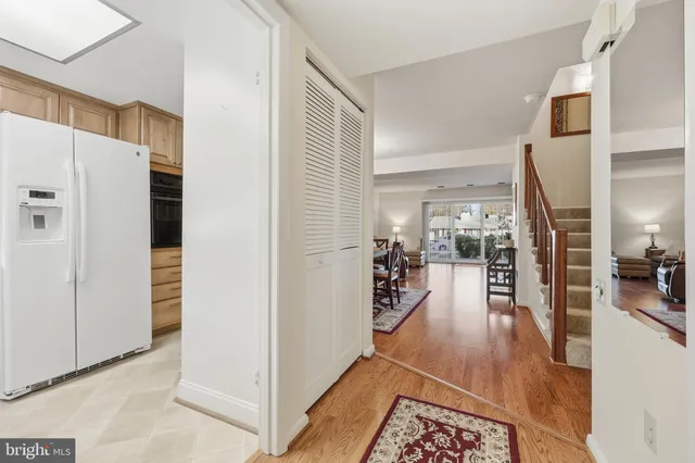 a view of a living room and dining room