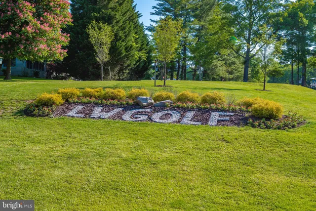 a outdoor view with sitting space and garden view