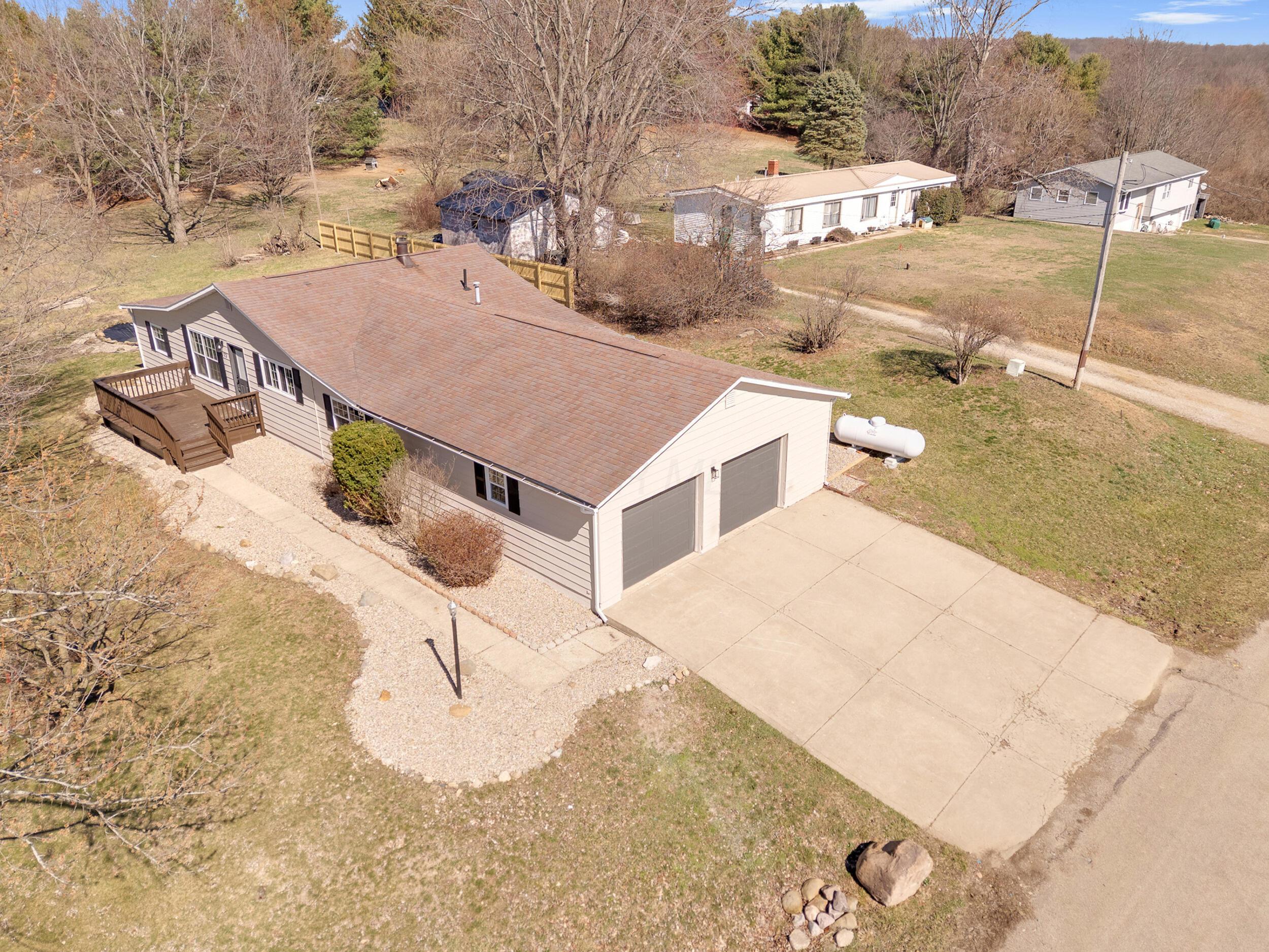 72 McCoy Road St. Louisville, OH 43071 - Photo 1 of 29 5_dji_20260308143811_0397_d
