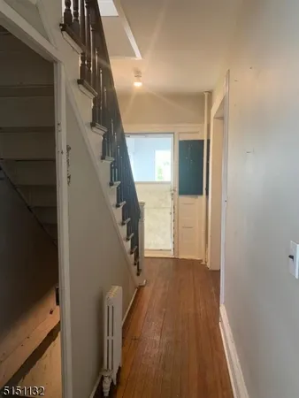 a view of hallway with stairs