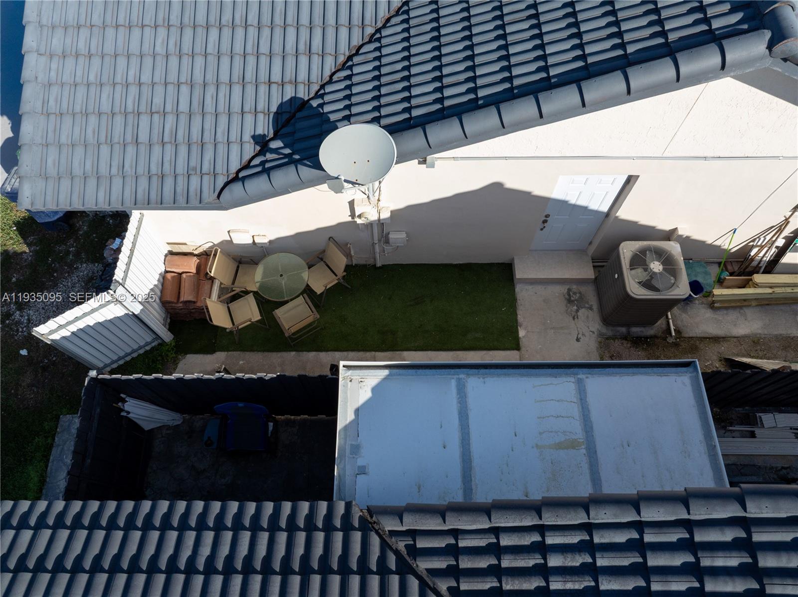 3219 Southwest 141st Avenue, Unit 1 Miami, FL 33175 - Photo 14 of 17 a table with wine bottles and glasses on it