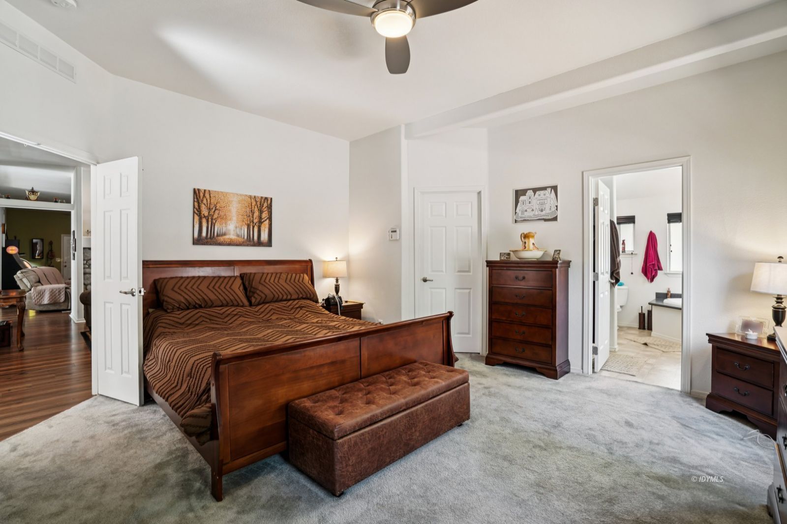 25001 Rim Rock Road Idyllwild, CA 92549 - Photo 26 of 50 a spacious bedroom with a bed and cabinets