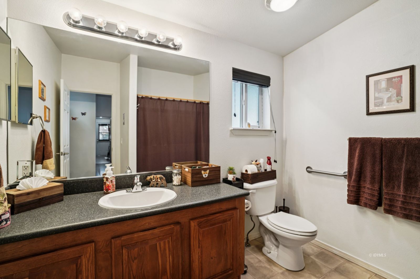 25001 Rim Rock Road Idyllwild, CA 92549 - Photo 38 of 50 a bathroom with a granite countertop sink and a mirror