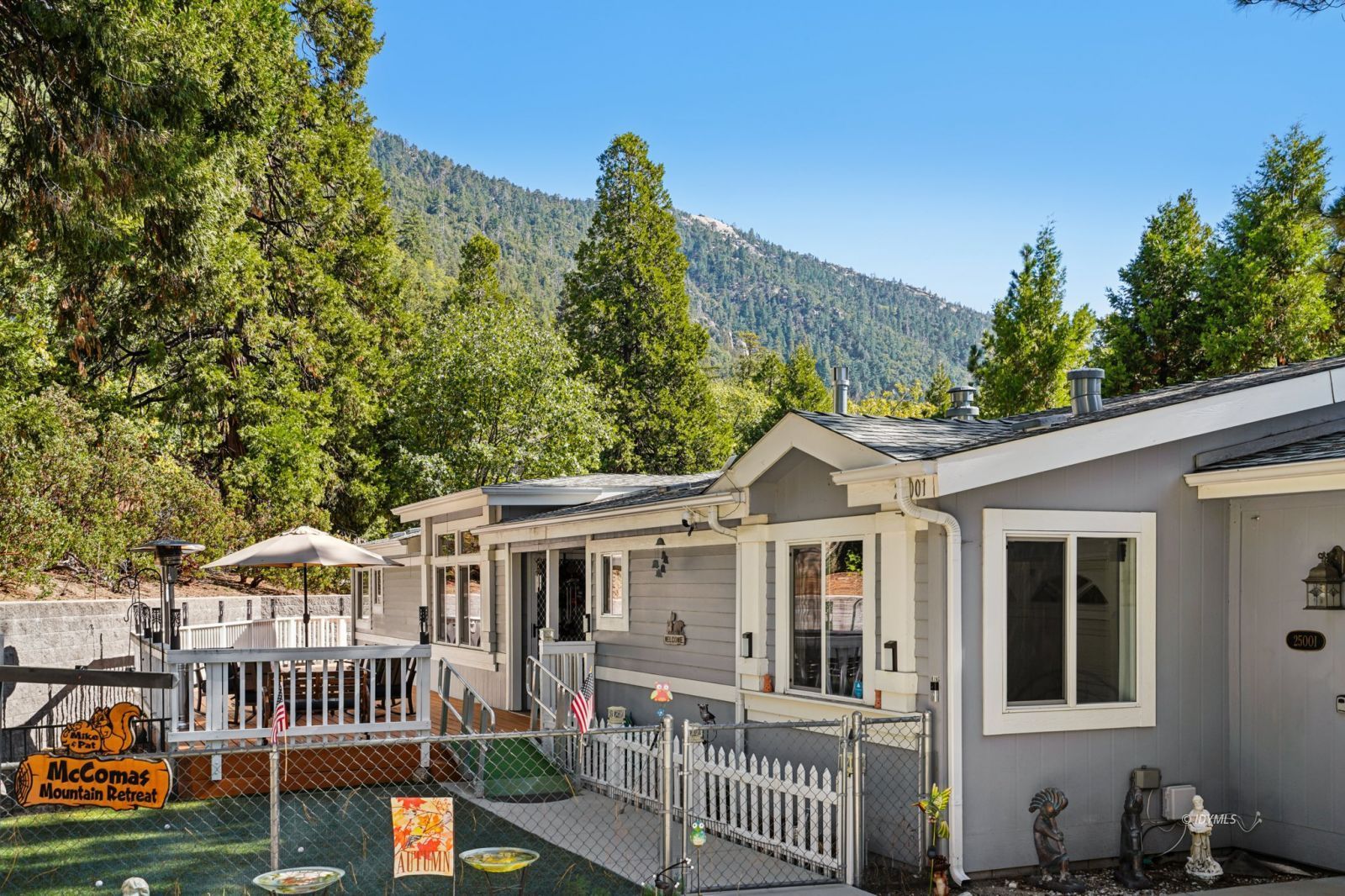 25001 Rim Rock Road Idyllwild, CA 92549 - Photo 41 of 50 a front view of a house with a garden