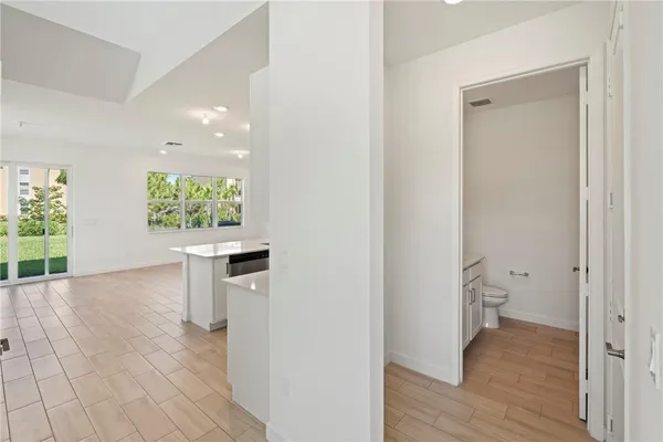 a view of entryway with wooden floor