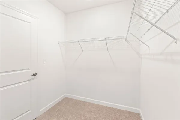 a view of a room with racks on the wall