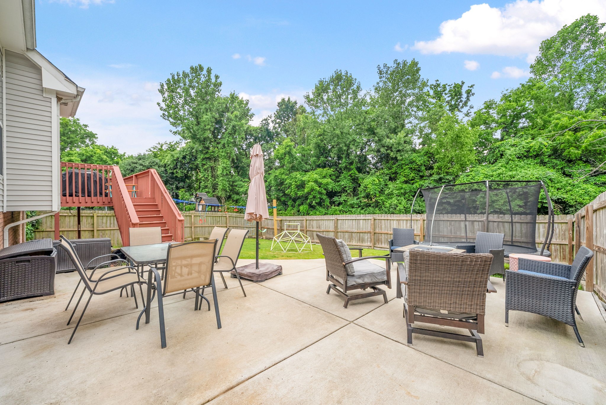 1161 Cynthia Lane Spring Hill, TN 37174 - Photo 33 of 42 a view of a patio with a table and chairs
