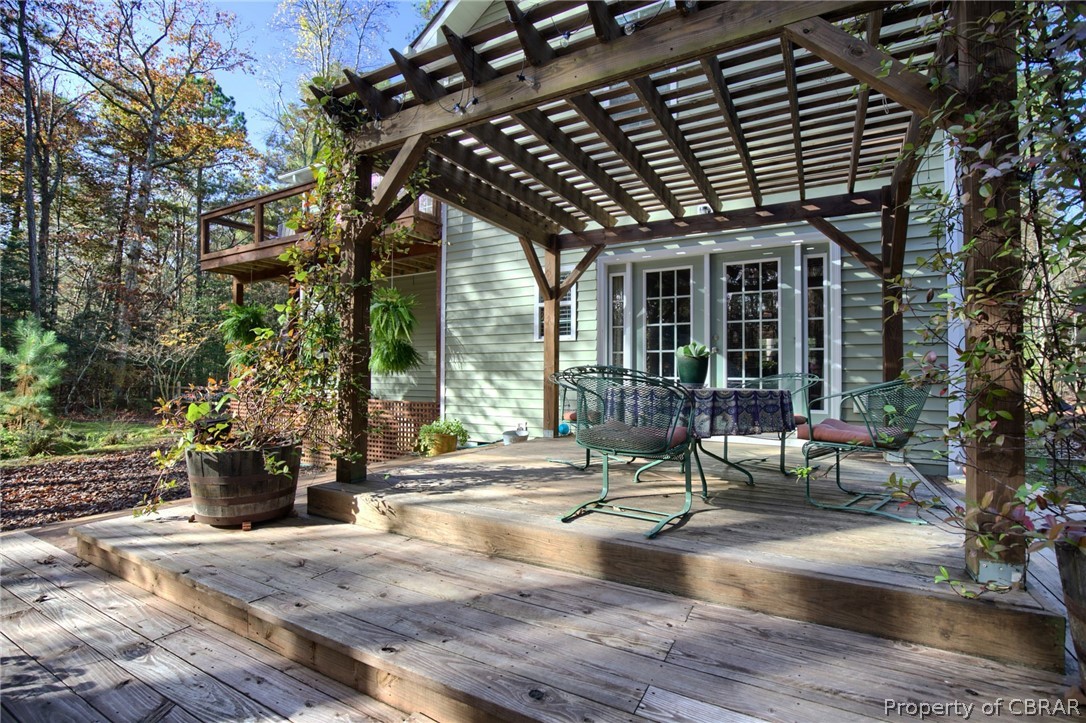 8755 Indian Road Gloucester, VA 23061 - Photo 32 of 41 Rear deck pergola