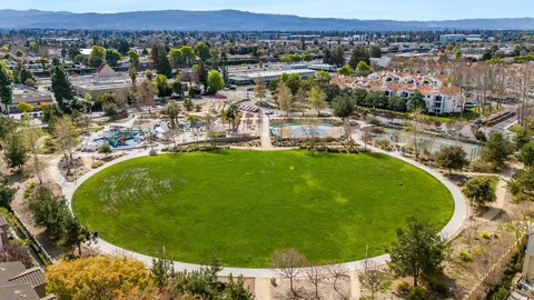 a view of a outdoor space and basketball court