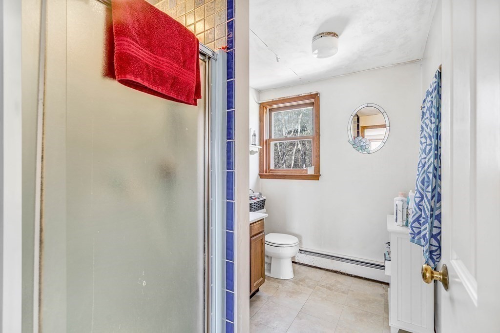 36 Autumn Road Lunenburg, MA 01462 - Photo 15 of 29 a bathroom with a toilet a sink and tub