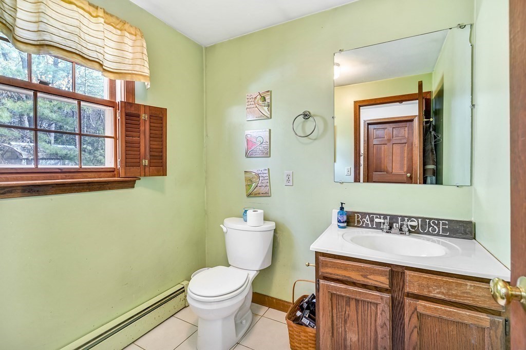 36 Autumn Road Lunenburg, MA 01462 - Photo 7 of 29 a bathroom with a toilet sink and mirror