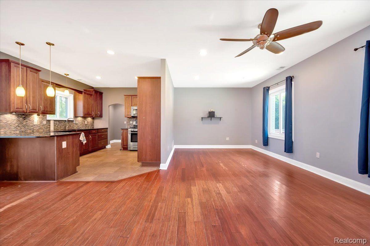 2930 Clarkston Road Lake Orion, MI 48362 - Photo 8 of 26 Kitchen, Dining, and Living Rooms.