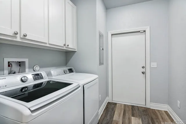a utility room with dryer and washer
